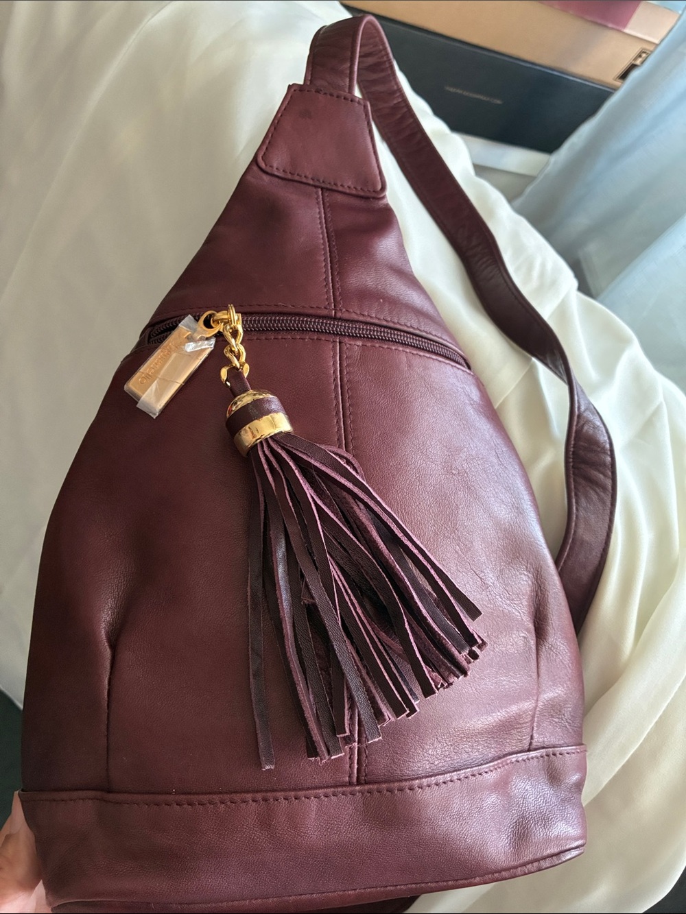 Tignanello Burgundy Leather Tassel Sling Crossbody